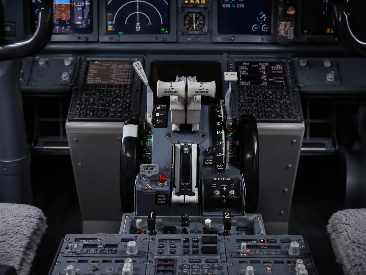 Throttle levers on the cockpit center pedestal